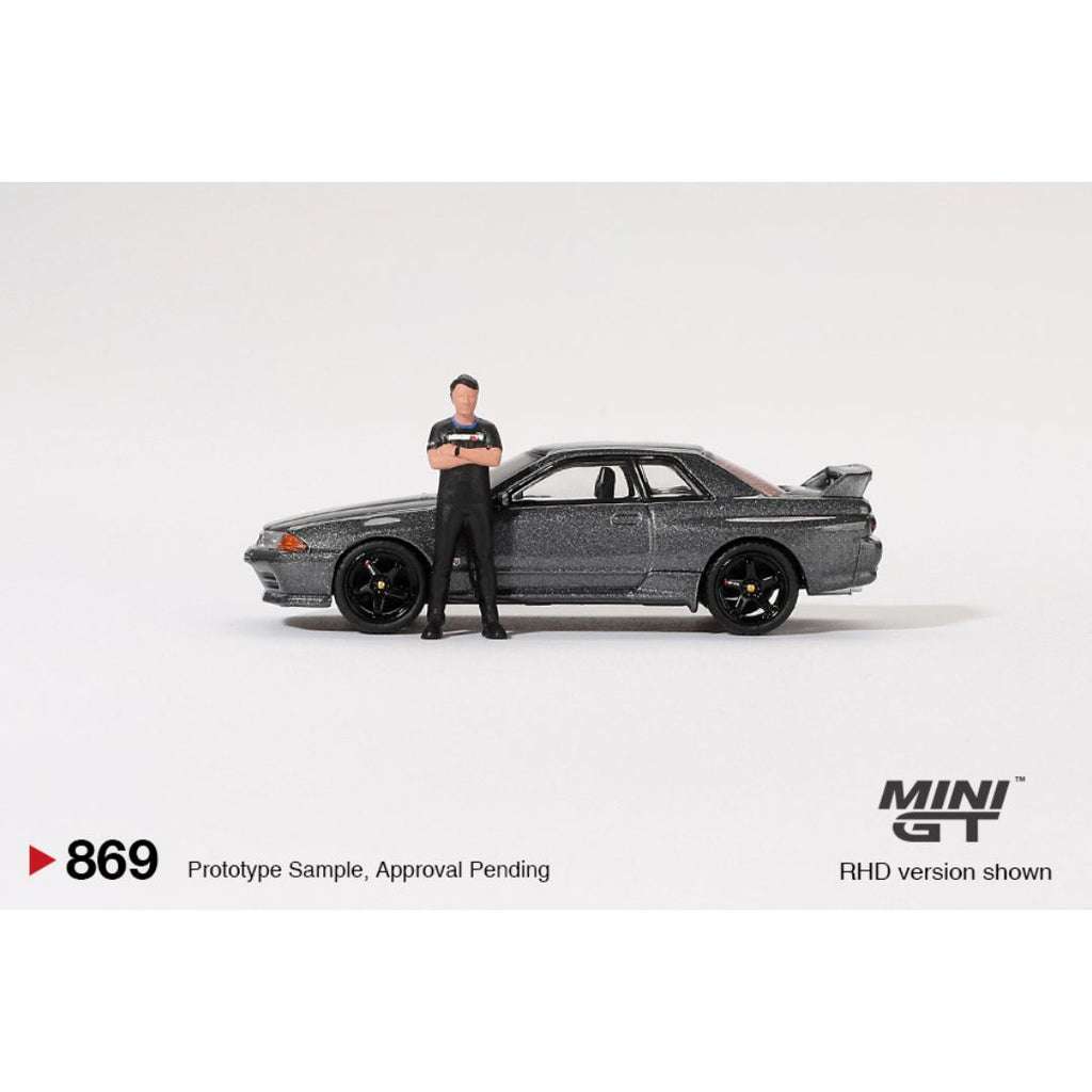 *EN CAMINO* Mini GT Nissan Skyline GT-R (R32) Gunmetal W/ Matsuda Figure - 869