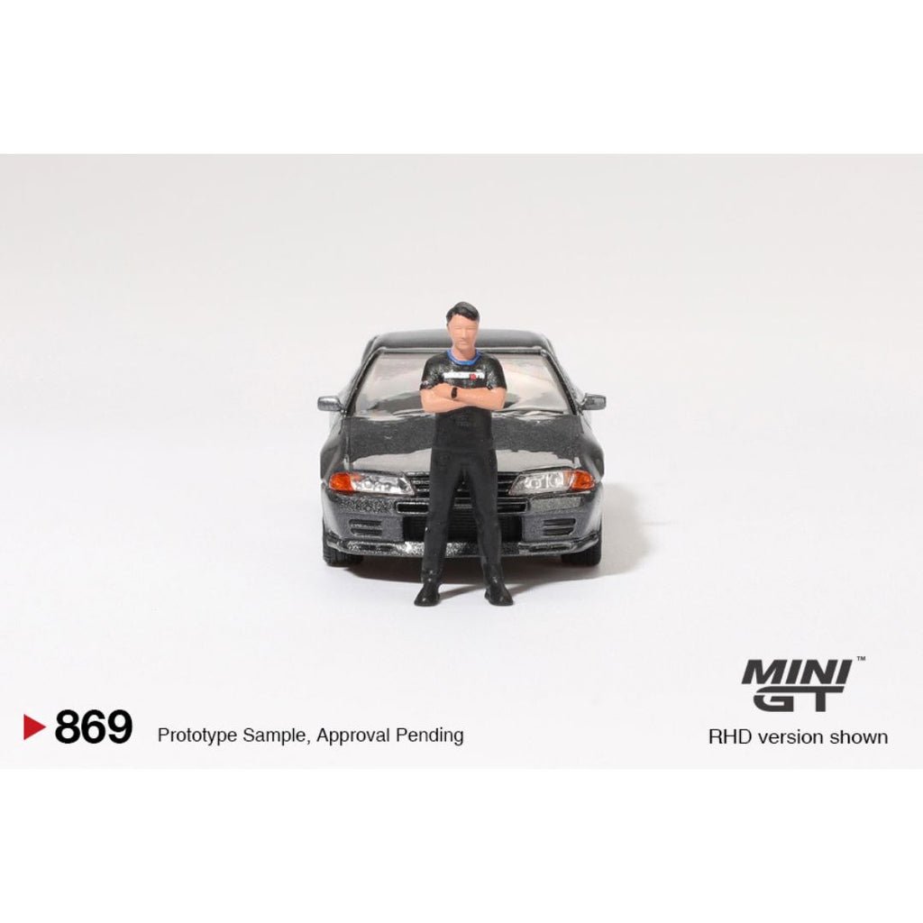 *EN CAMINO* Mini GT Nissan Skyline GT-R (R32) Gunmetal W/ Matsuda Figure - 869